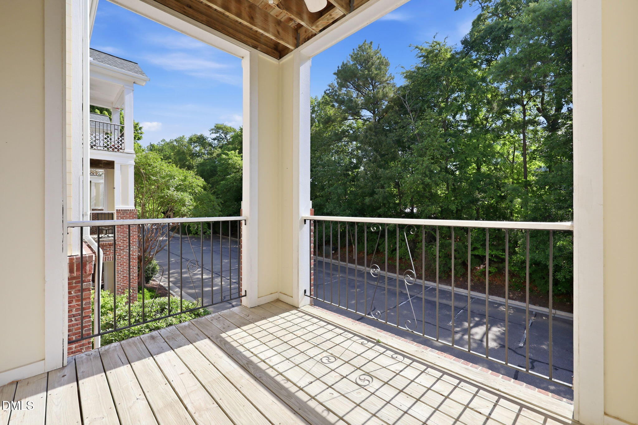 801 Moratuck Drive, Unit 202 Raleigh, NC 27604 - Photo 22 of 23 a view of balcony with wooden floor