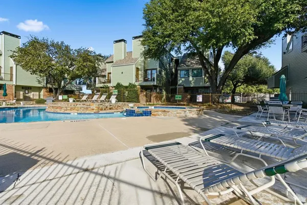 a view of a house with swimming pool