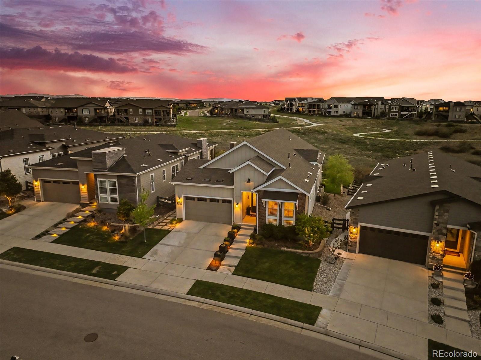 2101 Rim Ridge Drive Castle Pines, CO 80108 - Photo 1 of 50 a view of a city from a terrace