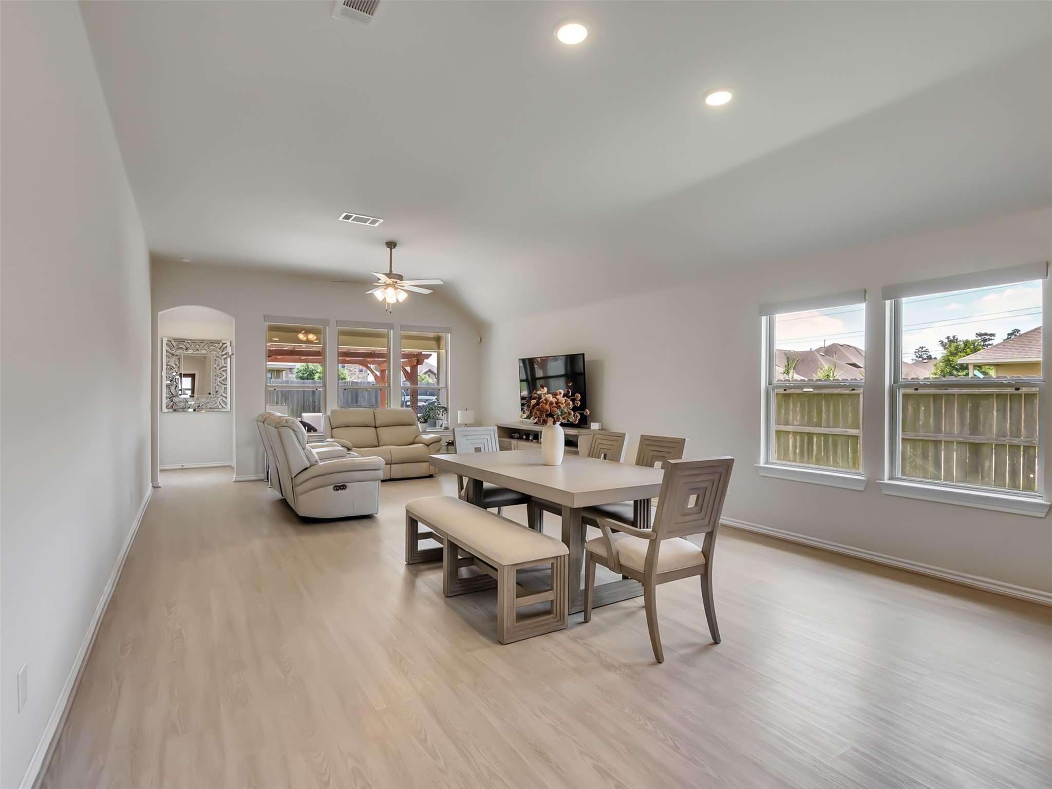 27997 Lone Hollow Lane Spring, TX 77386 - Photo 27 of 45 a view of a dining room with furniture and wooden floor