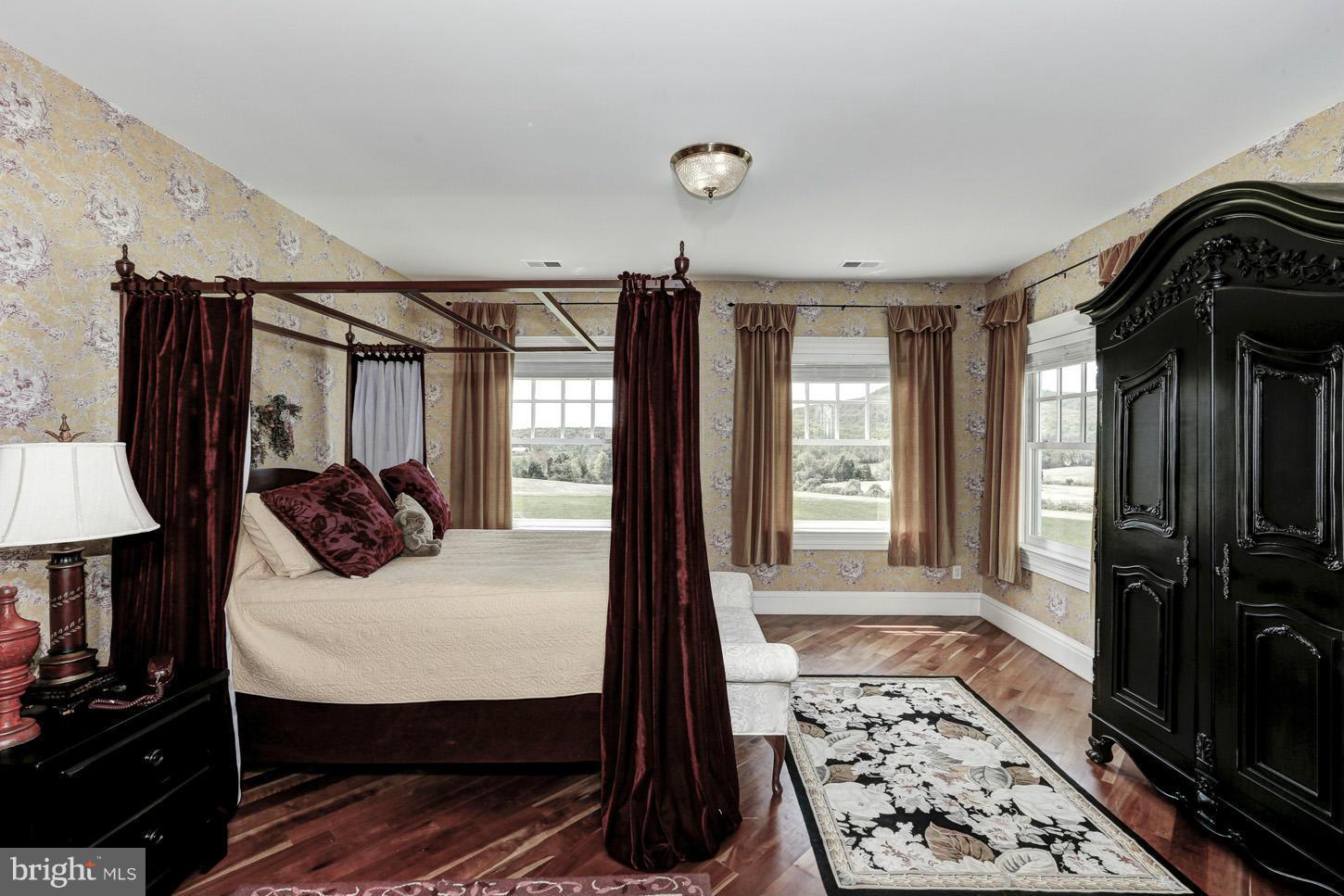 17705 Comus Road Dickerson, MD 20842 - Photo 22 of 30 a bedroom with bed and wooden floor