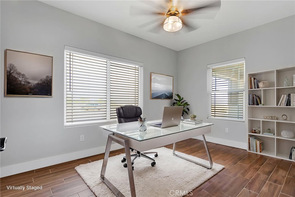 10055 Eaby Road Phelan, CA 92371 - Photo 18 of 19 a workspace with furniture and a window