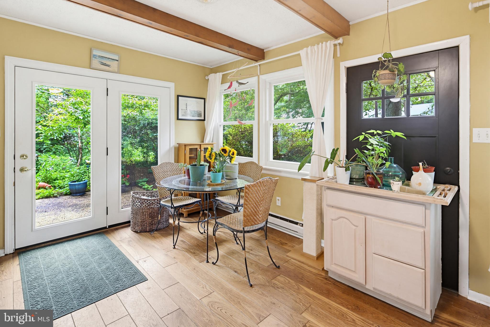 919 Blue Ridge Drive Annapolis, MD 21409 - Photo 24 of 30 a dining room with furniture and large windows