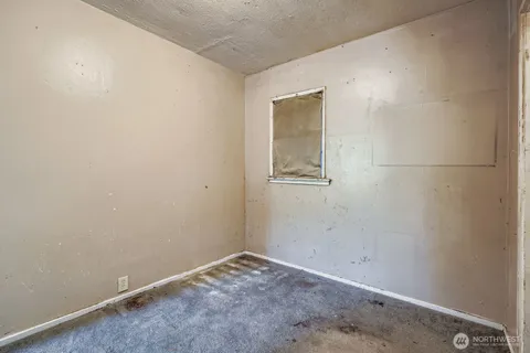 an empty room with a door