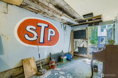 a room with furniture and a flat screen tv