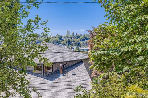 an aerial view of residential house with outdoor space