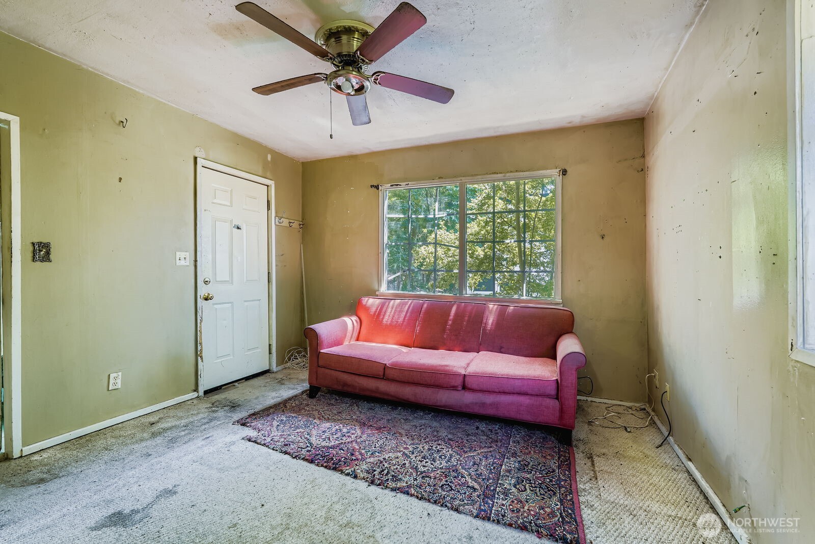 2814 South Grand Street Seattle, WA 98144 - Photo 4 of 23 a living room with furniture and a large window