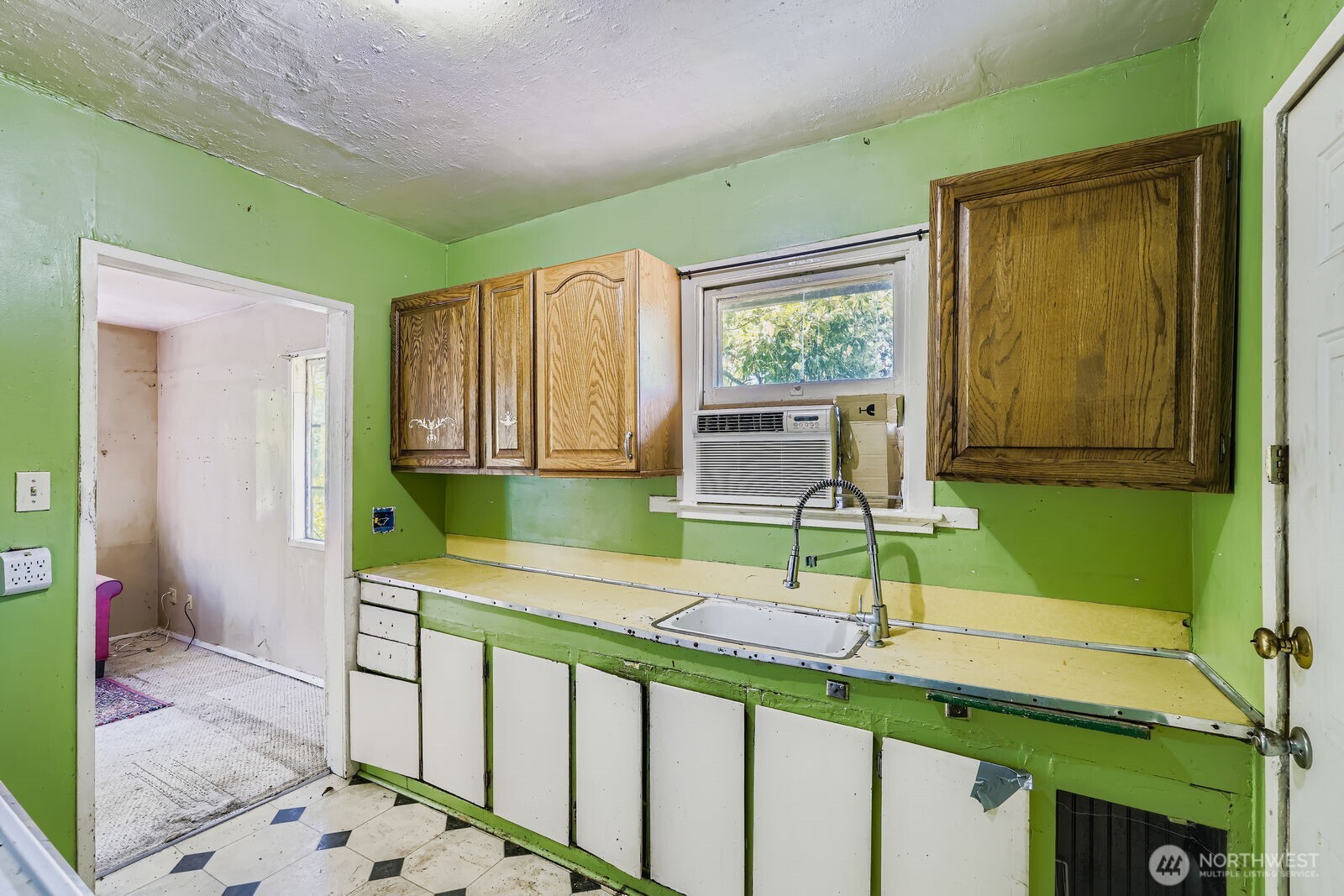 2814 South Grand Street Seattle, WA 98144 - Photo 9 of 23 a kitchen with a sink and a cabinets