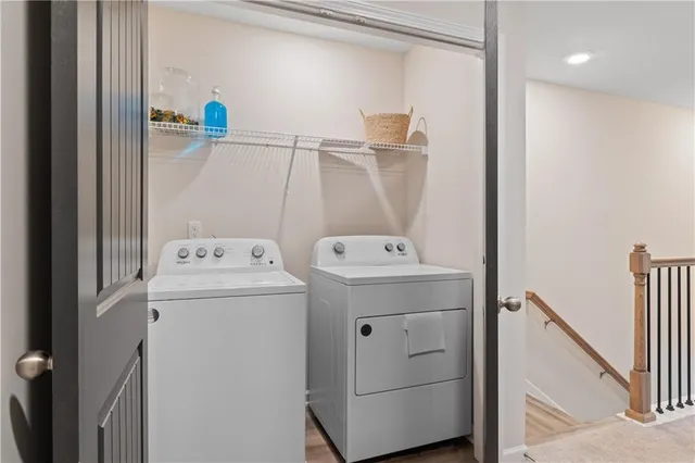 a utility room with dryer and washer