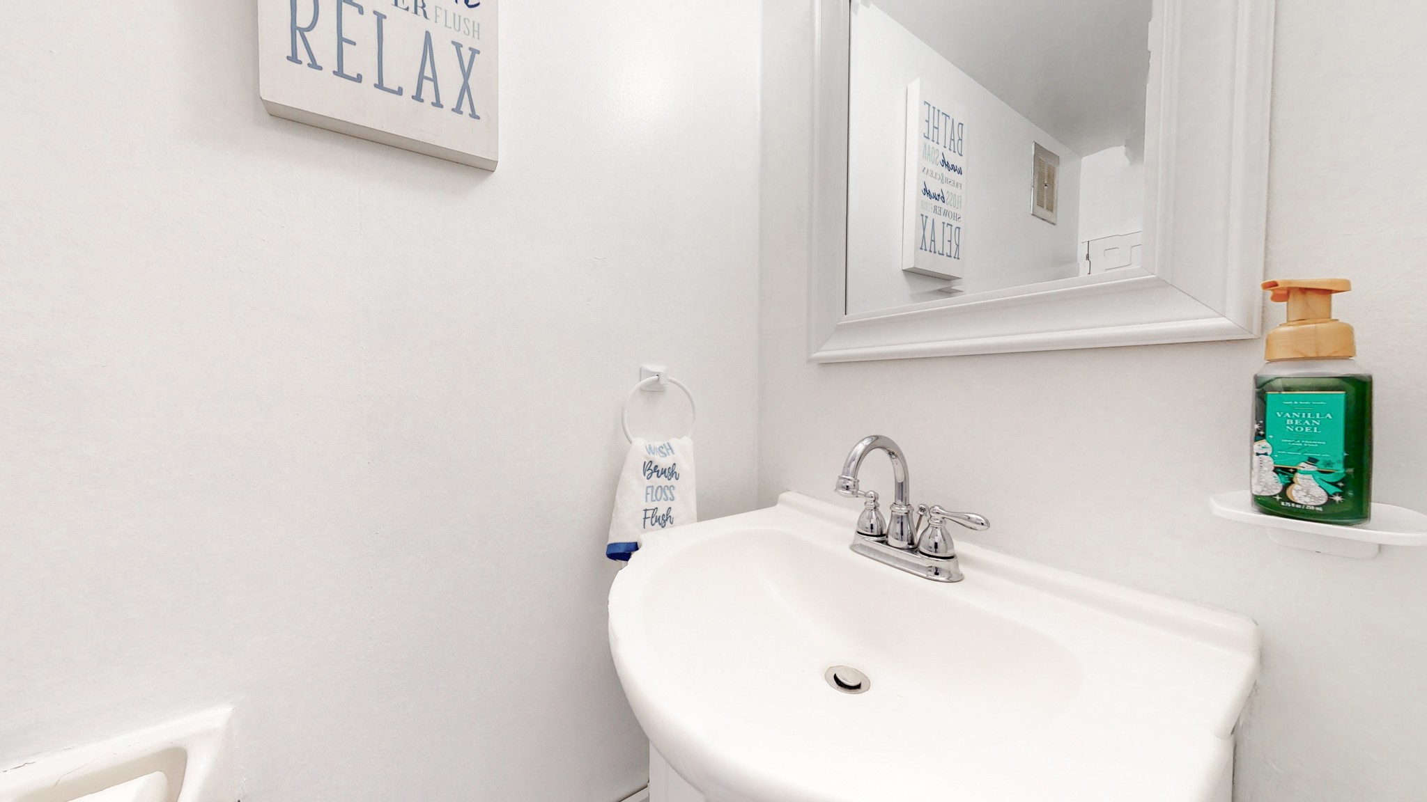 370 Wallace Road, Unit G3 Nashville, TN 37211 - Photo 16 of 30 a bathroom with a sink and a mirror