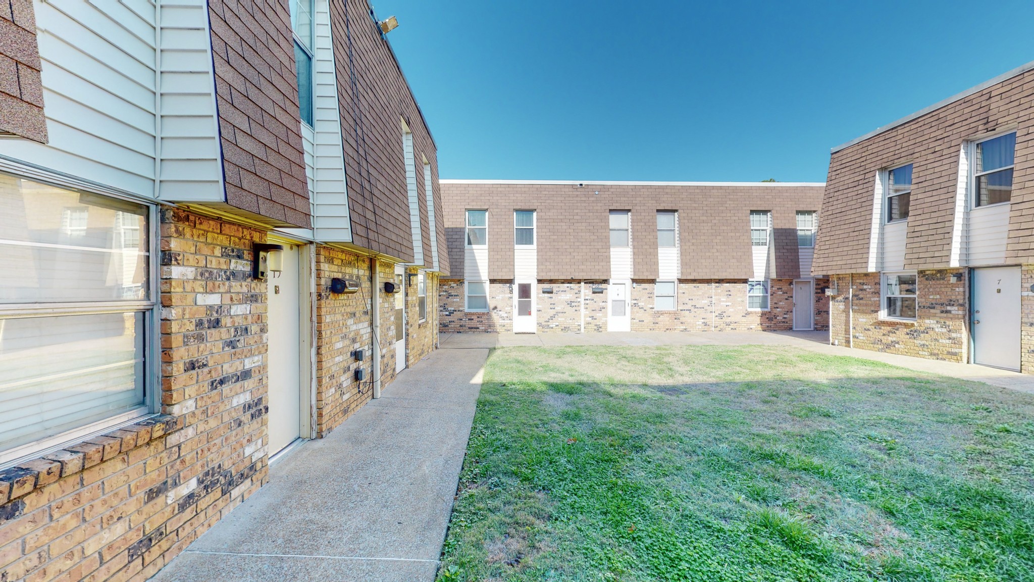 370 Wallace Road, Unit G3 Nashville, TN 37211 - Photo 2 of 30 a view of a porch with chairs and backyard