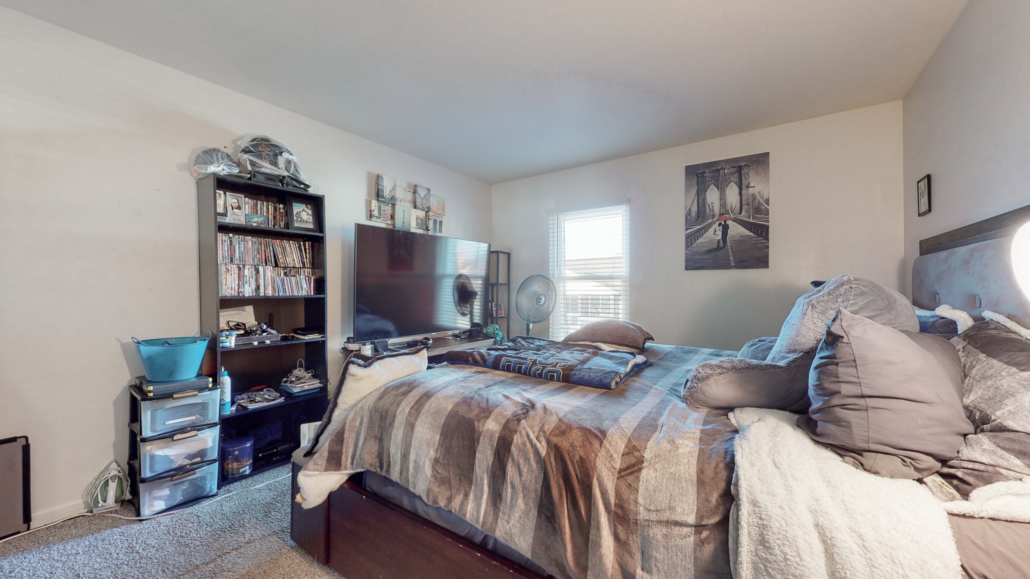 370 Wallace Road, Unit G3 Nashville, TN 37211 - Photo 22 of 30 a bedroom with a bed and a flat screen tv