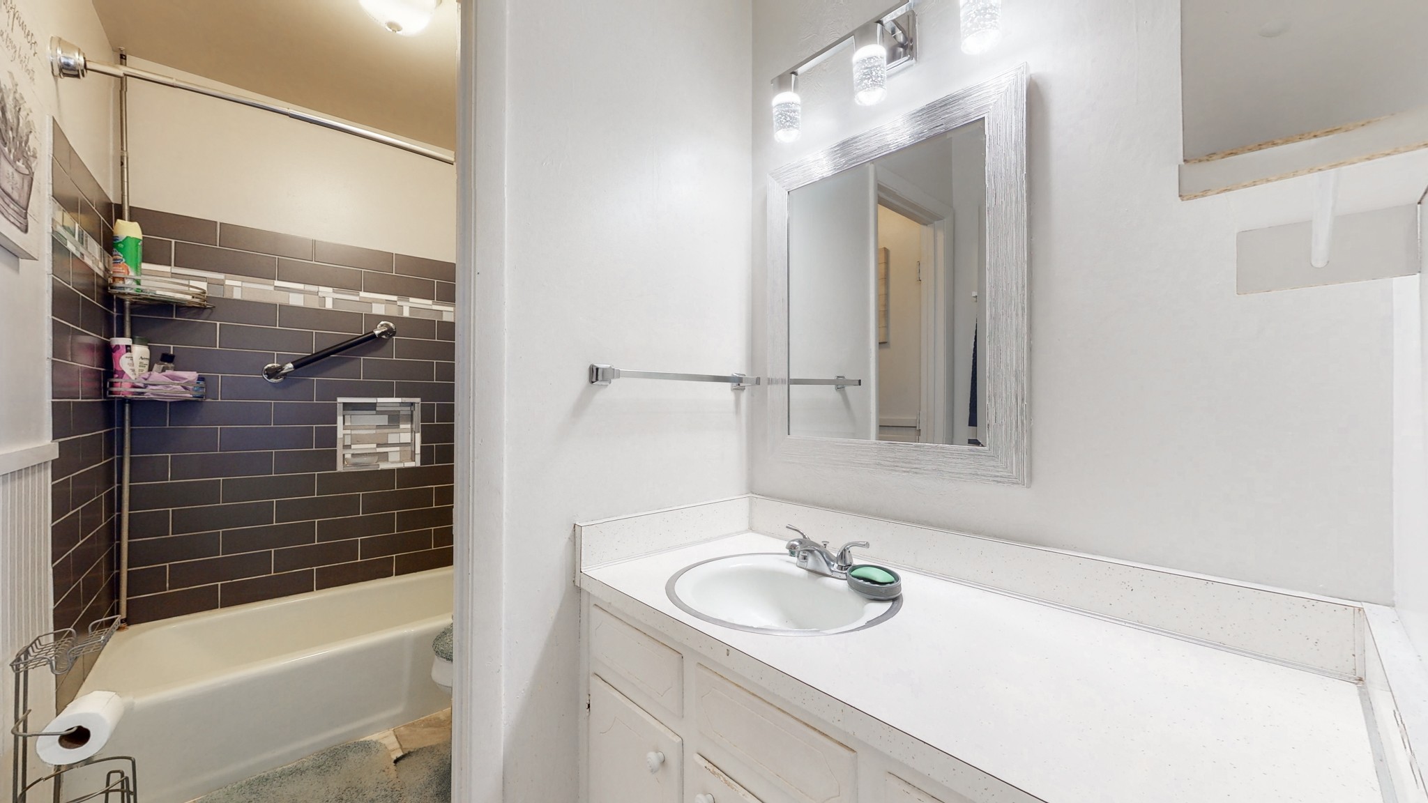 370 Wallace Road, Unit G3 Nashville, TN 37211 - Photo 24 of 30 a bathroom with a sink and a mirror