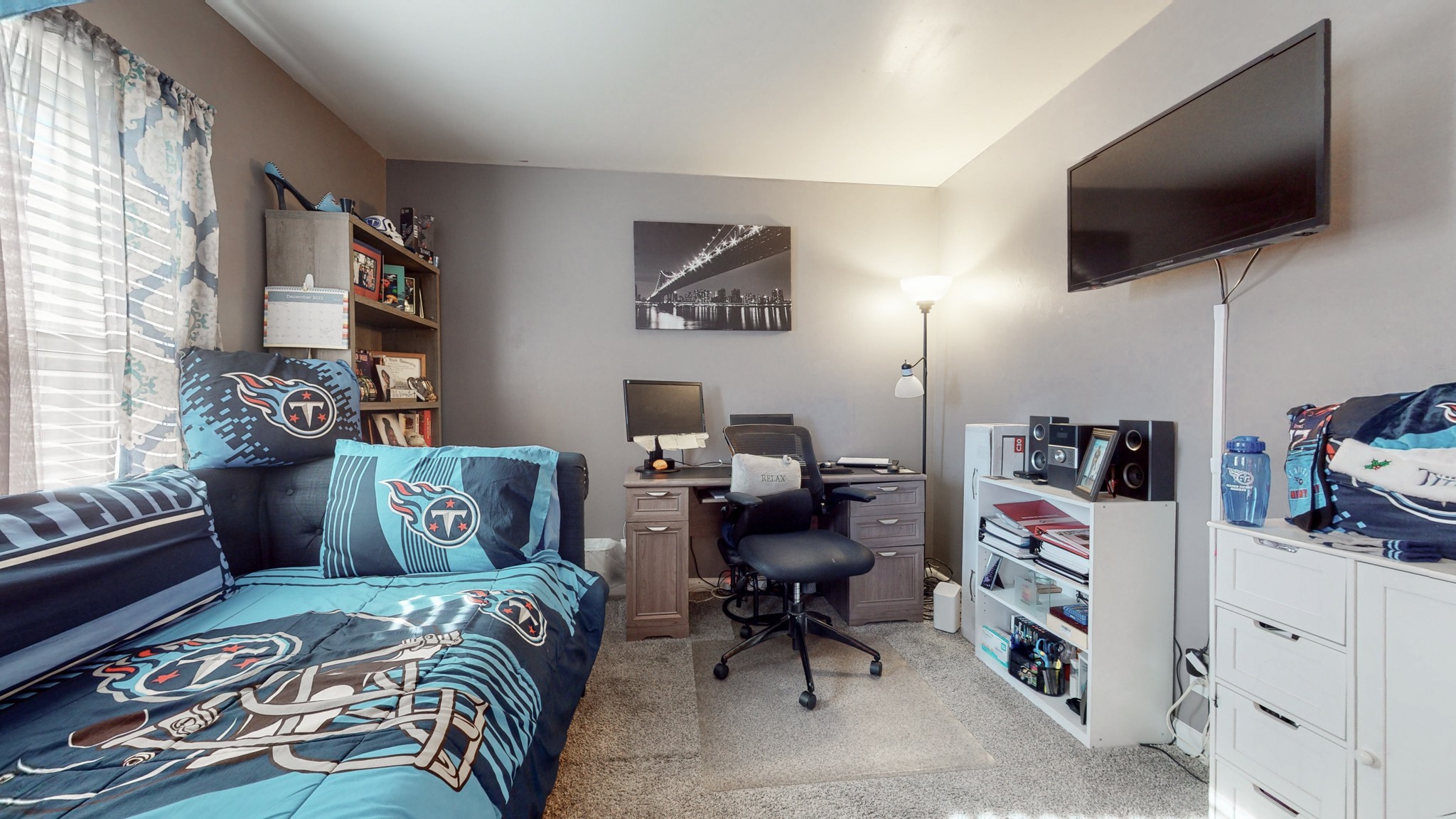 370 Wallace Road, Unit G3 Nashville, TN 37211 - Photo 27 of 30 a bedroom with a bed a flat screen tv and a window