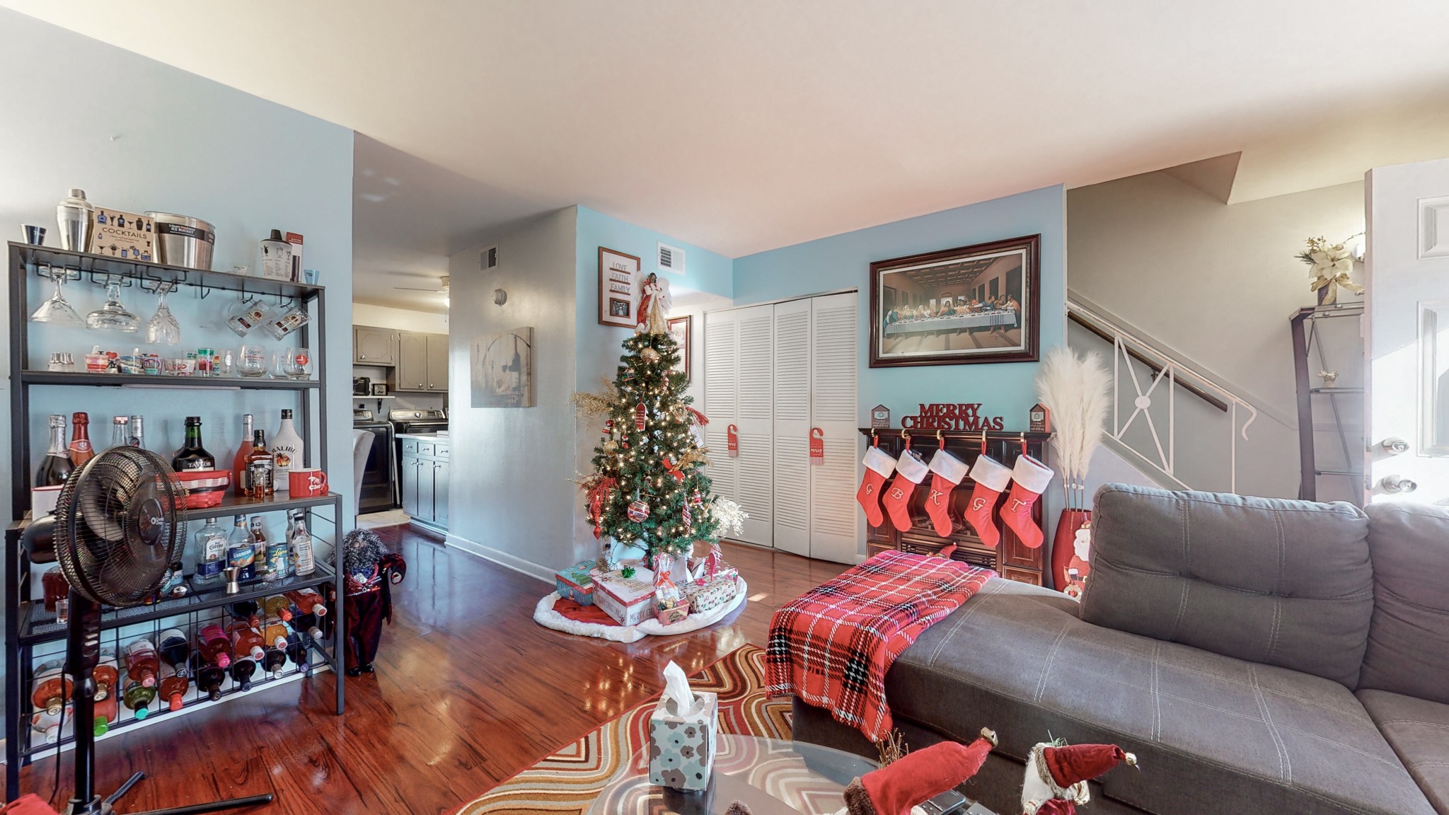 370 Wallace Road, Unit G3 Nashville, TN 37211 - Photo 3 of 30 a living room filled with lots of furniture and toys