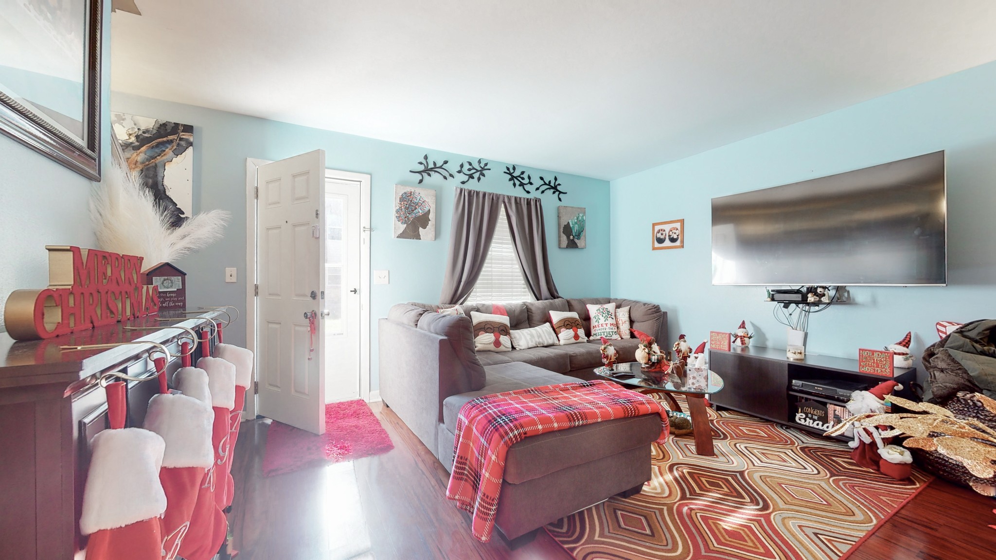 370 Wallace Road, Unit G3 Nashville, TN 37211 - Photo 6 of 30 a living room with furniture and a flat screen tv