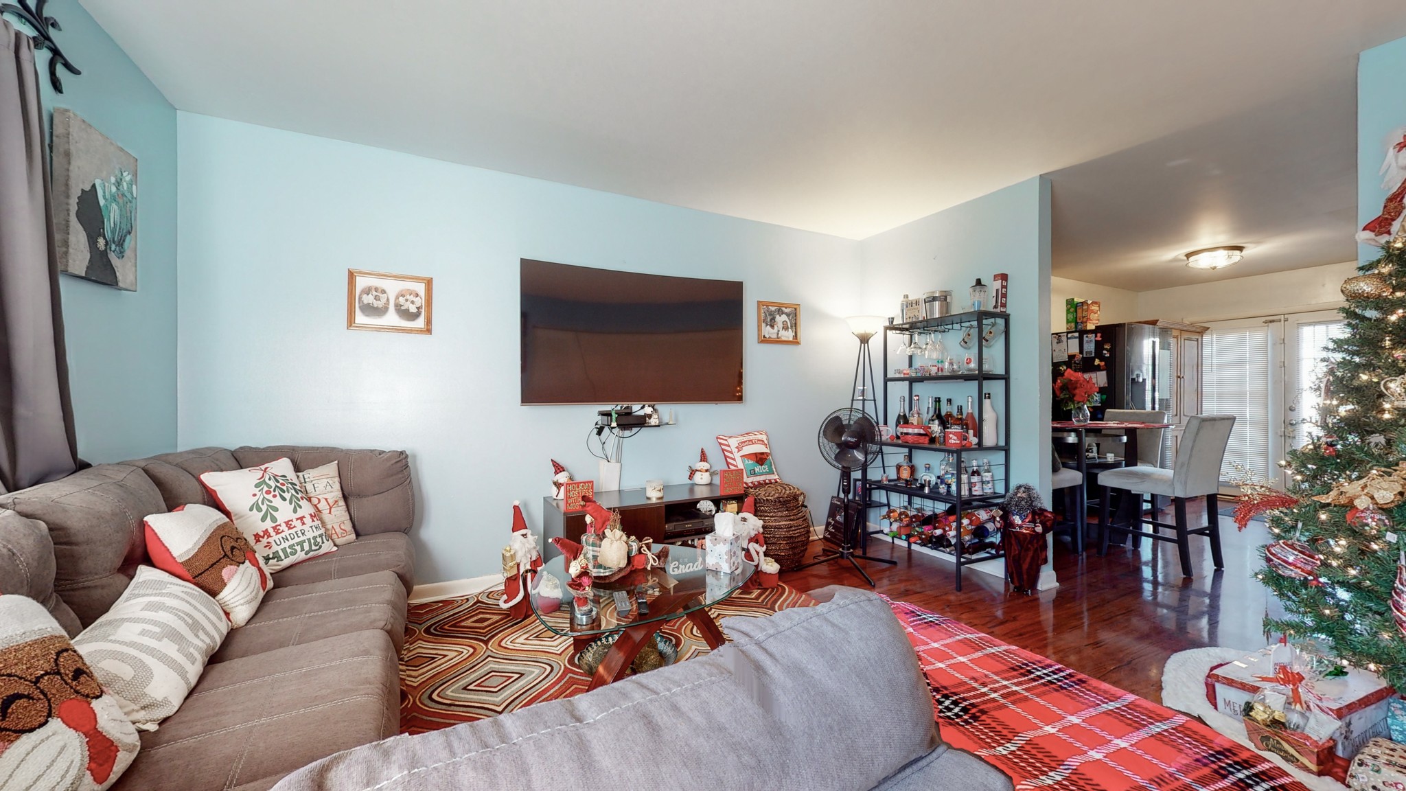 370 Wallace Road, Unit G3 Nashville, TN 37211 - Photo 7 of 30 a living room with furniture and a flat screen tv