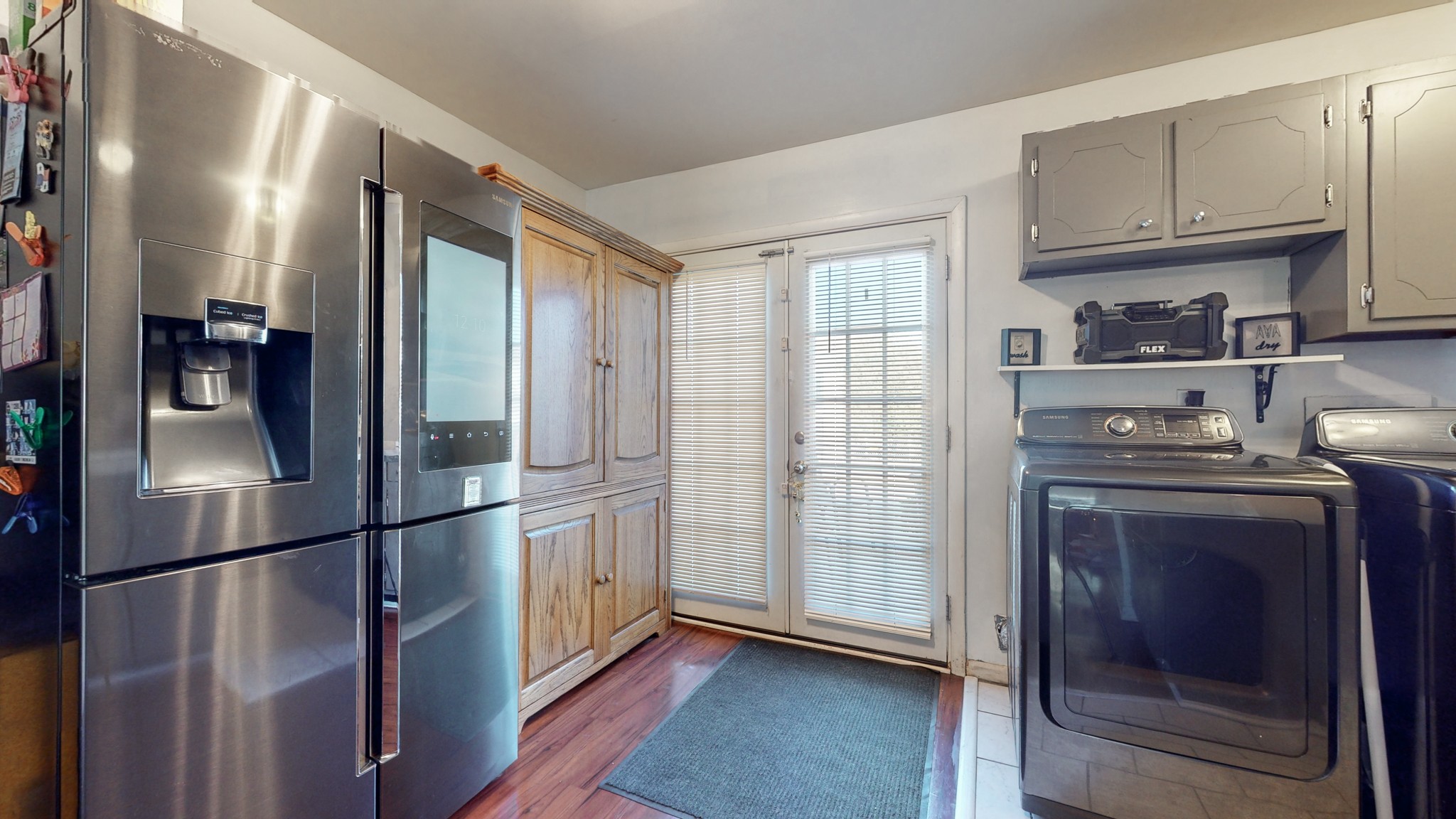 370 Wallace Road, Unit G3 Nashville, TN 37211 - Photo 9 of 30 a kitchen with stainless steel appliances granite countertop a refrigerator and a stove top oven