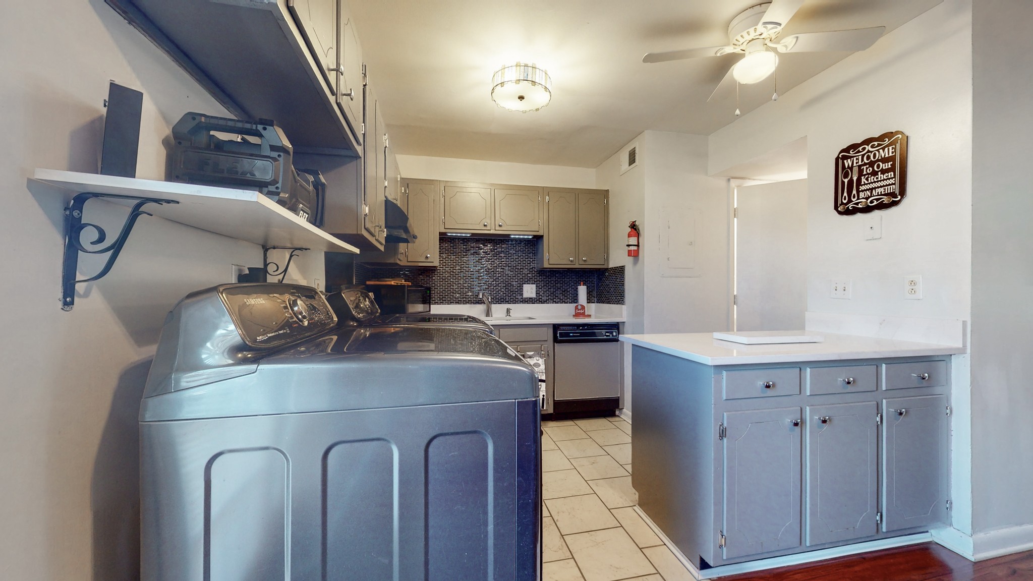 370 Wallace Road, Unit G3 Nashville, TN 37211 - Photo 10 of 30 a kitchen with cabinets a sink and appliances