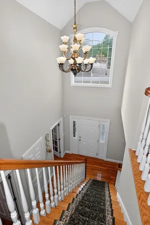 a view of entryway with wooden floor