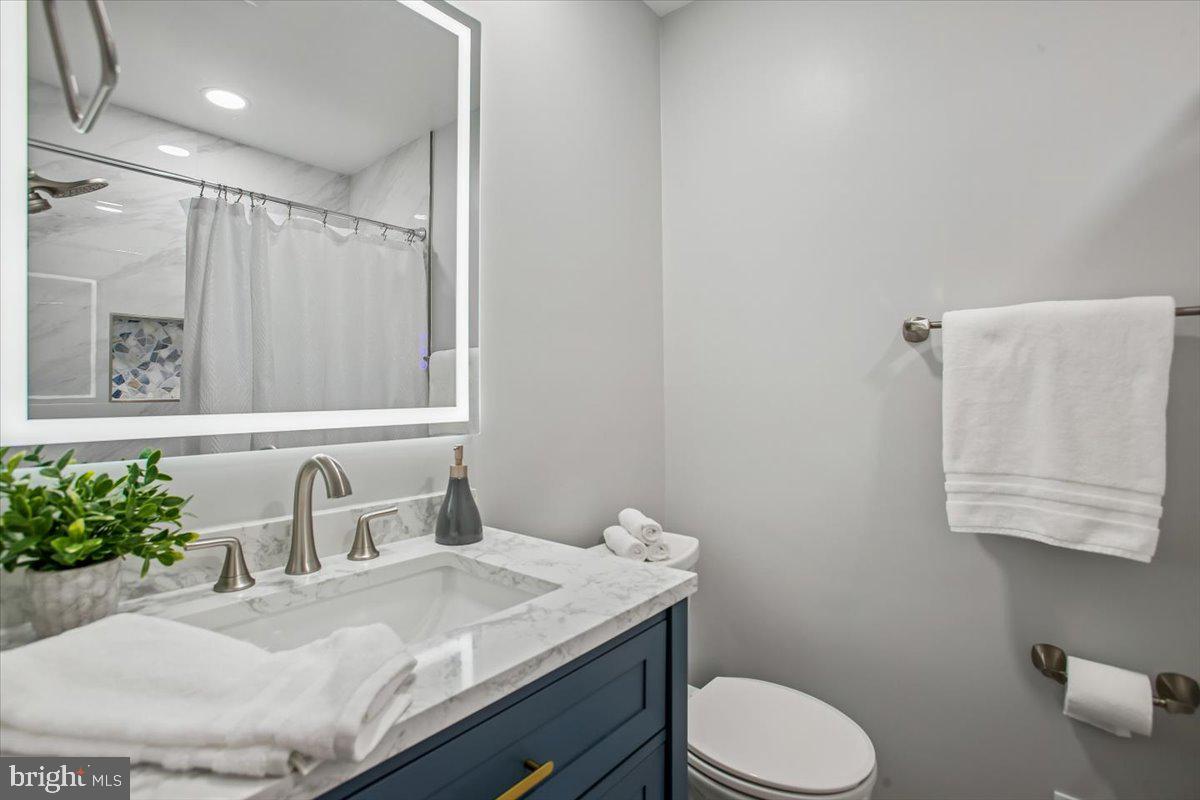 6916 Ruskin Street Springfield, VA 22150 - Photo 32 of 53 Remodeled Main Level Hall Bath