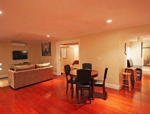 385 Barnes Road Oak Bluffs, MA 02557 - Photo 11 of 29 a living room with furniture and wooden floor