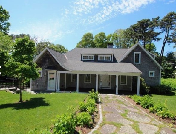 385 Barnes Road Oak Bluffs, MA 02557 - Photo 26 of 29 front view of a house with a yard