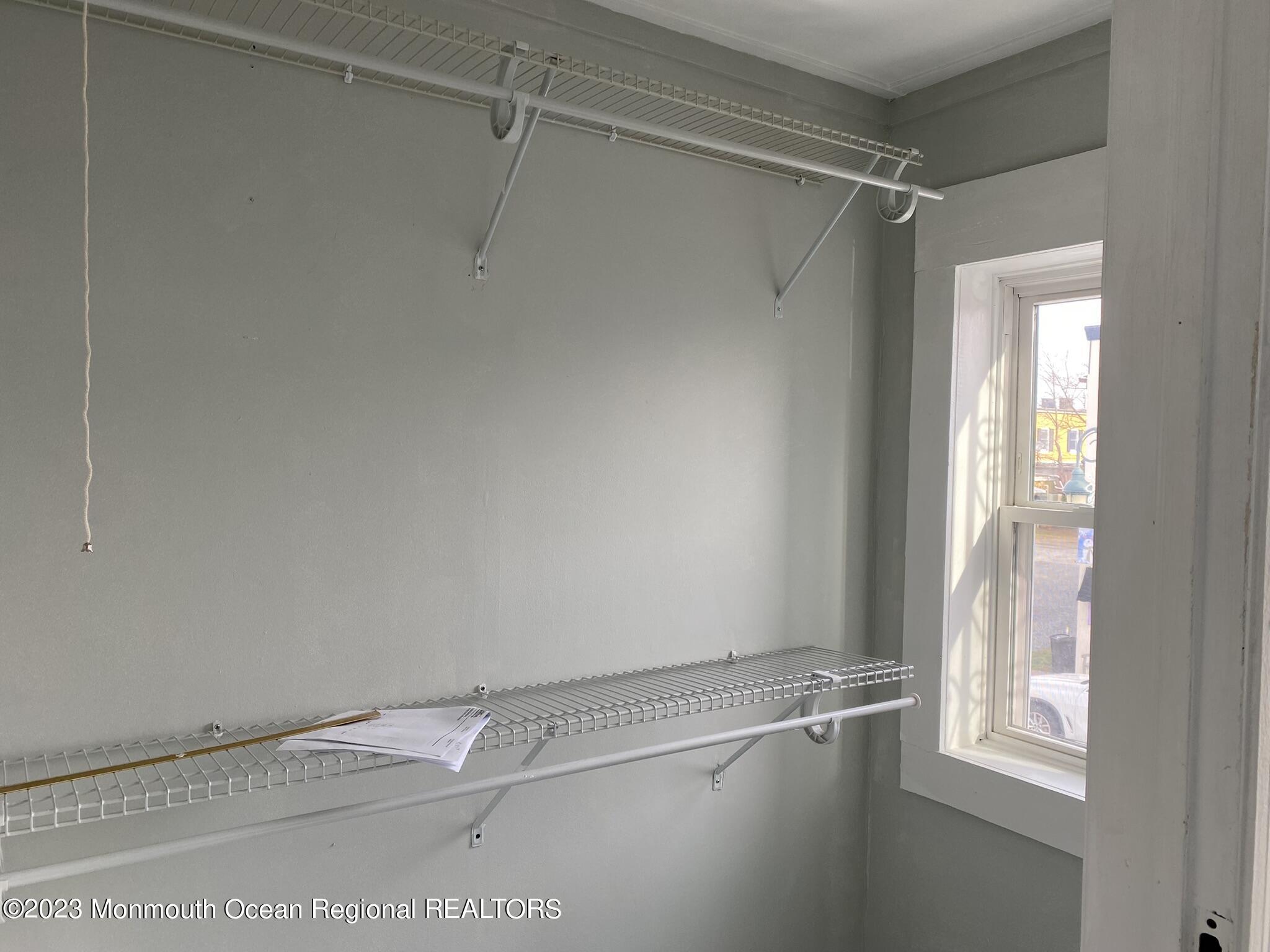 511 Bay Avenue, Unit 2 Point Pleasant Beach, NJ 08742 - Photo 9 of 13 a view of an empty room with a window