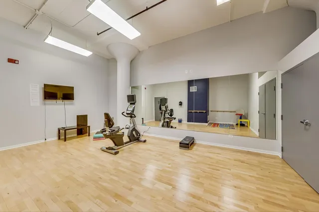 a bed room with a bed and a couch