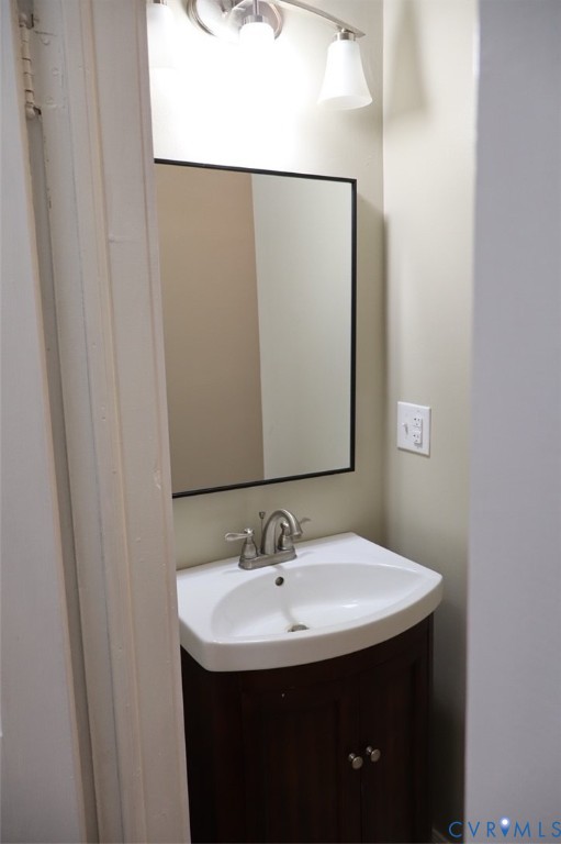 9540 Pridesville Road Amelia Court House, VA 23002 - Photo 14 of 15 a bathroom with a sink and a mirror