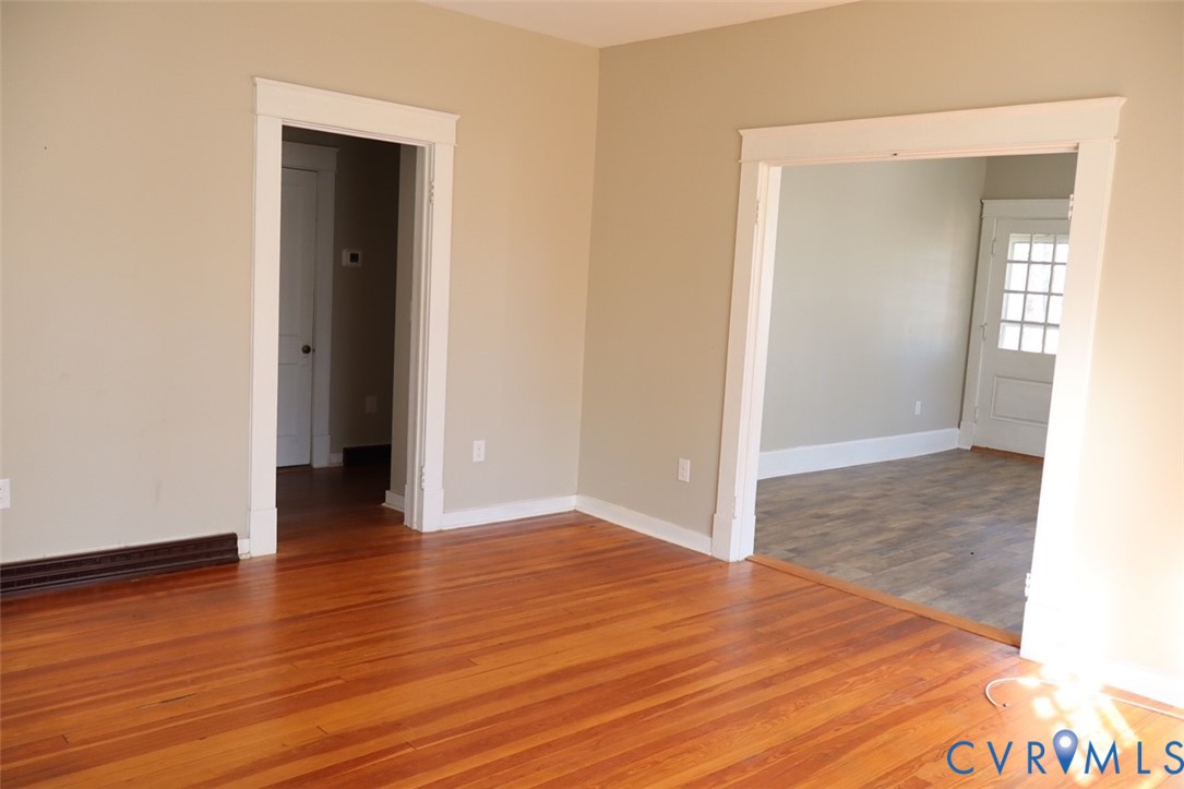 9540 Pridesville Road Amelia Court House, VA 23002 - Photo 7 of 15 wooden floor in an empty room
