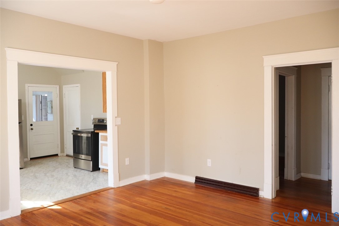 9540 Pridesville Road Amelia Court House, VA 23002 - Photo 8 of 15 a view of a room with wooden floor and staircase