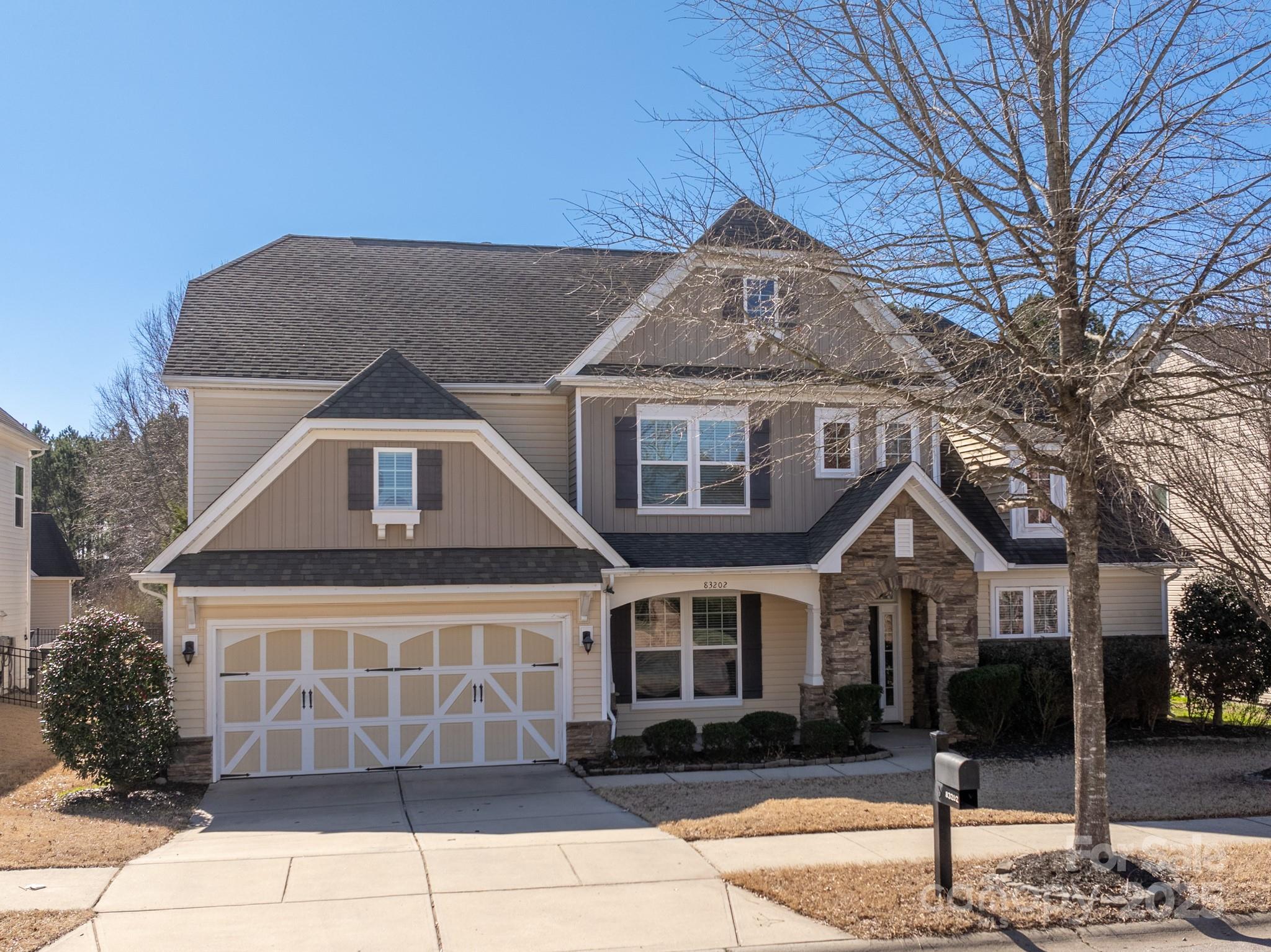 83202 Cortland Drive Lancaster, SC 29720 - Photo 1 of 47 a front view of a house with a yard