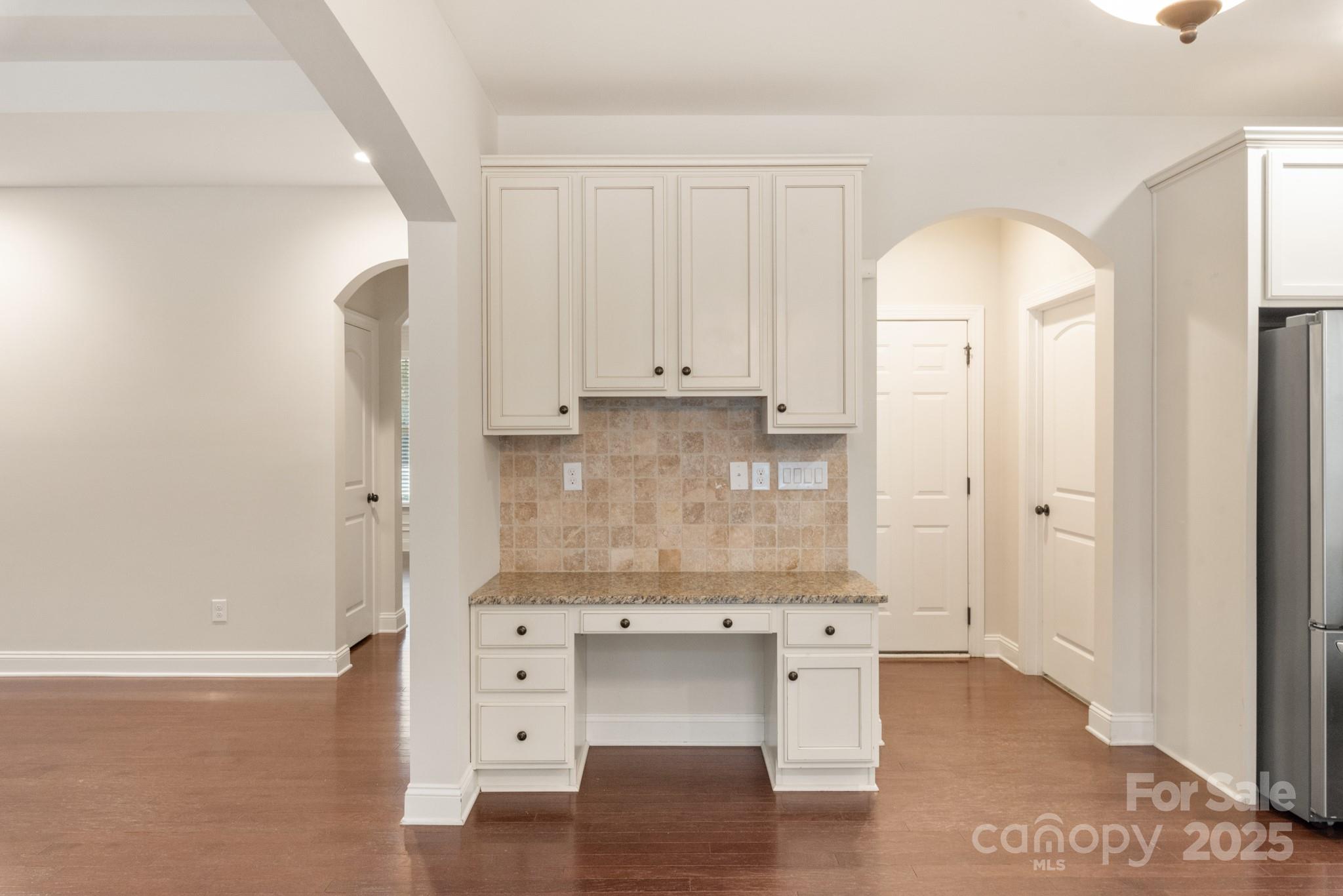83202 Cortland Drive Lancaster, SC 29720 - Photo 13 of 47 a view of kitchen with stainless steel appliances cabinets and wooden floor