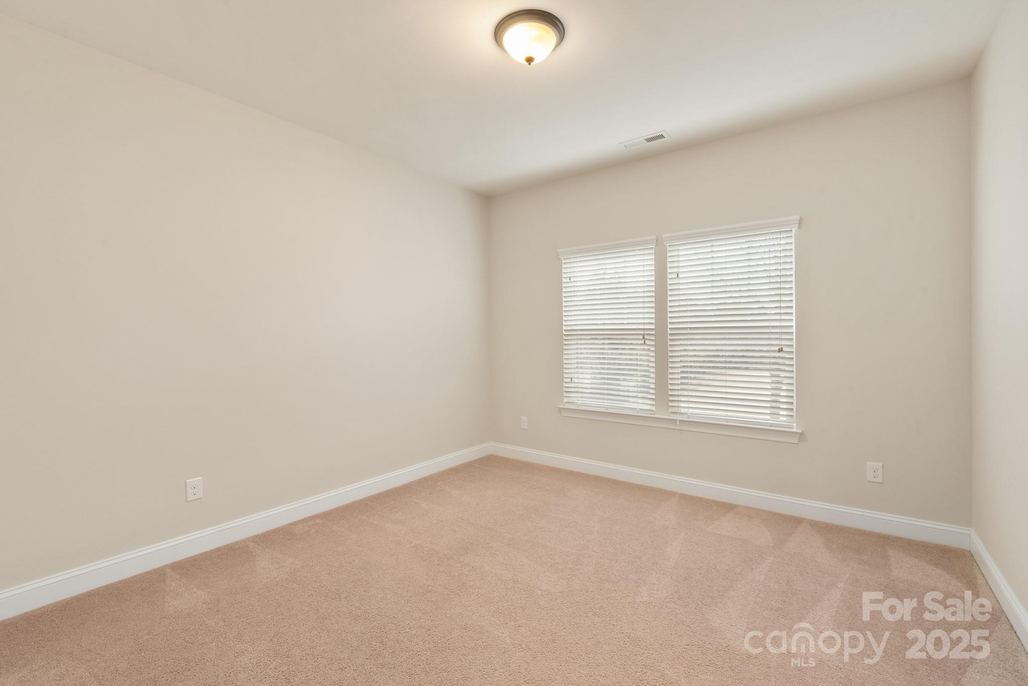83202 Cortland Drive Lancaster, SC 29720 - Photo 22 of 47 an empty room with a window