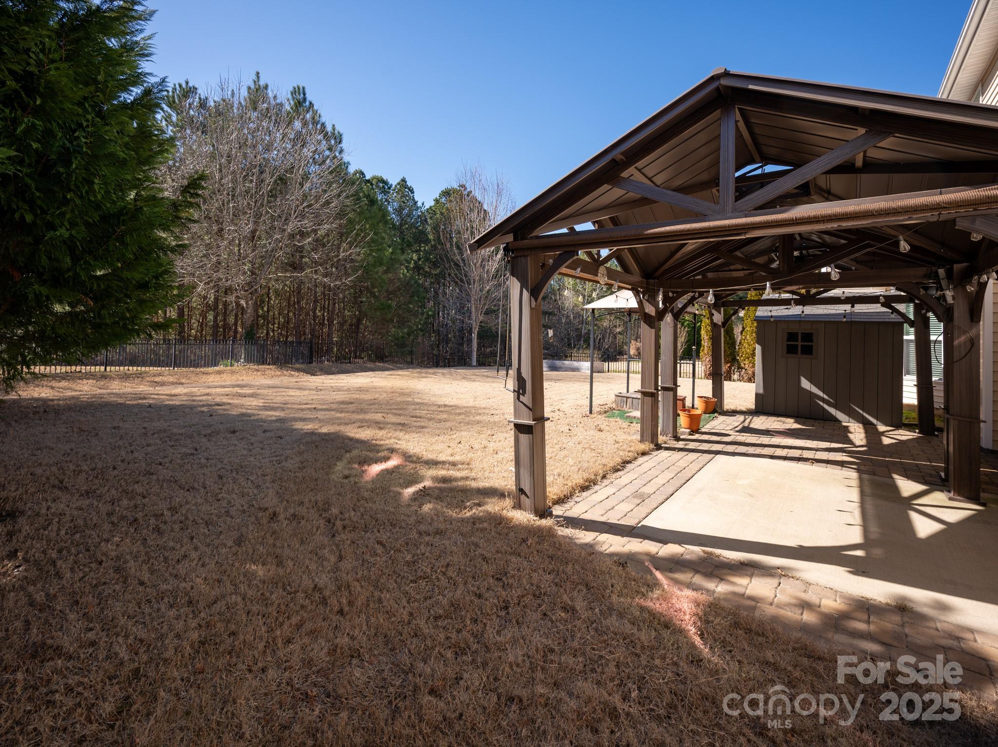 83202 Cortland Drive Lancaster, SC 29720 - Photo 40 of 47 a view of a house with backyard and trees