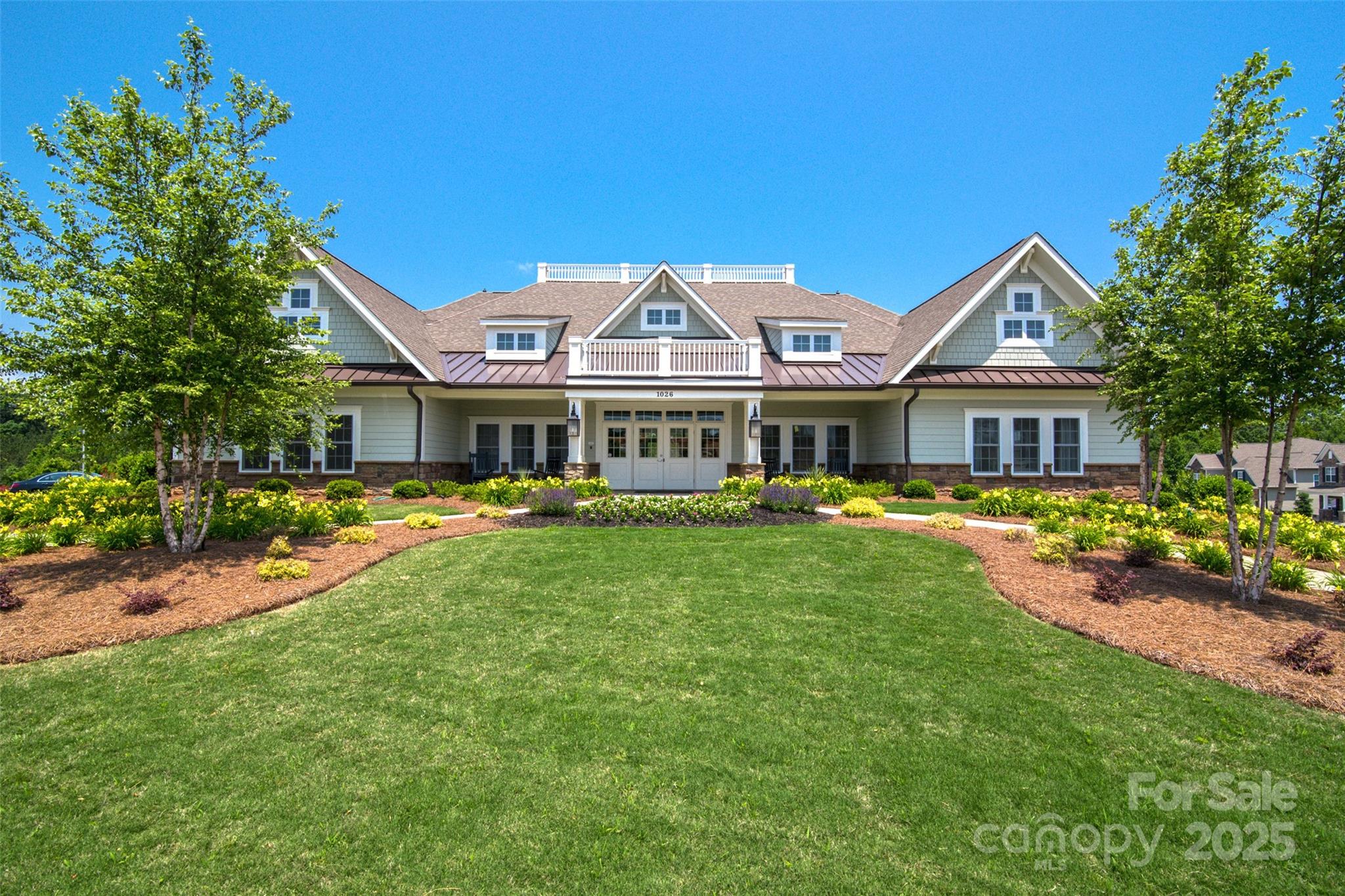 83202 Cortland Drive Lancaster, SC 29720 - Photo 41 of 47 a front view of a house with a garden