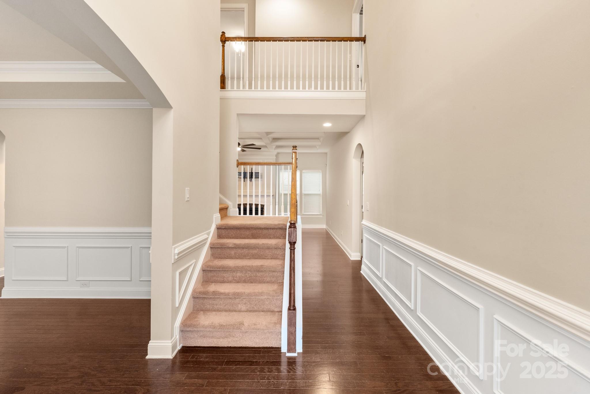 83202 Cortland Drive Lancaster, SC 29720 - Photo 5 of 47 a view of staircase with wooden floor and a window