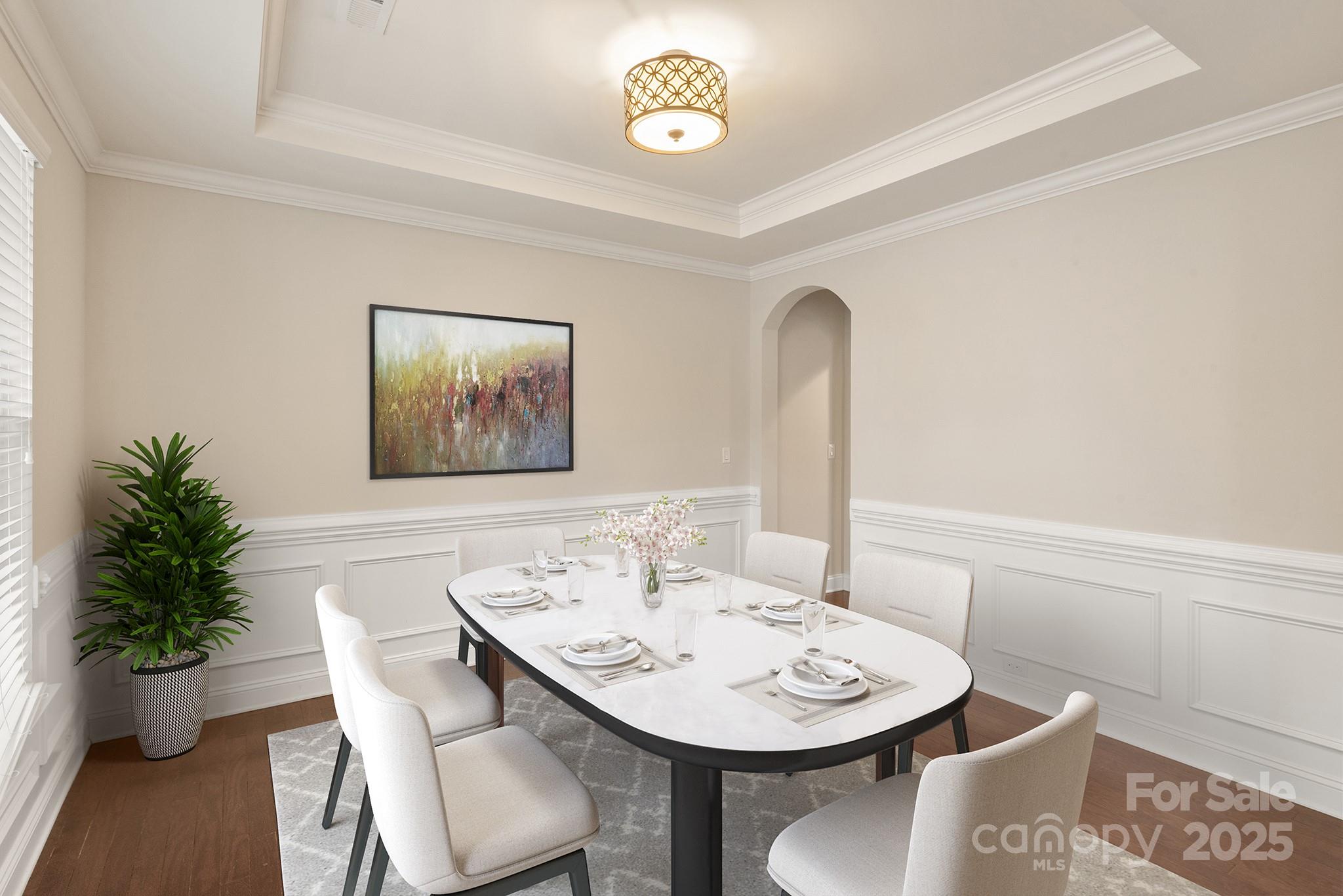 83202 Cortland Drive Lancaster, SC 29720 - Photo 6 of 47 a view of a dining room with furniture and potted plant