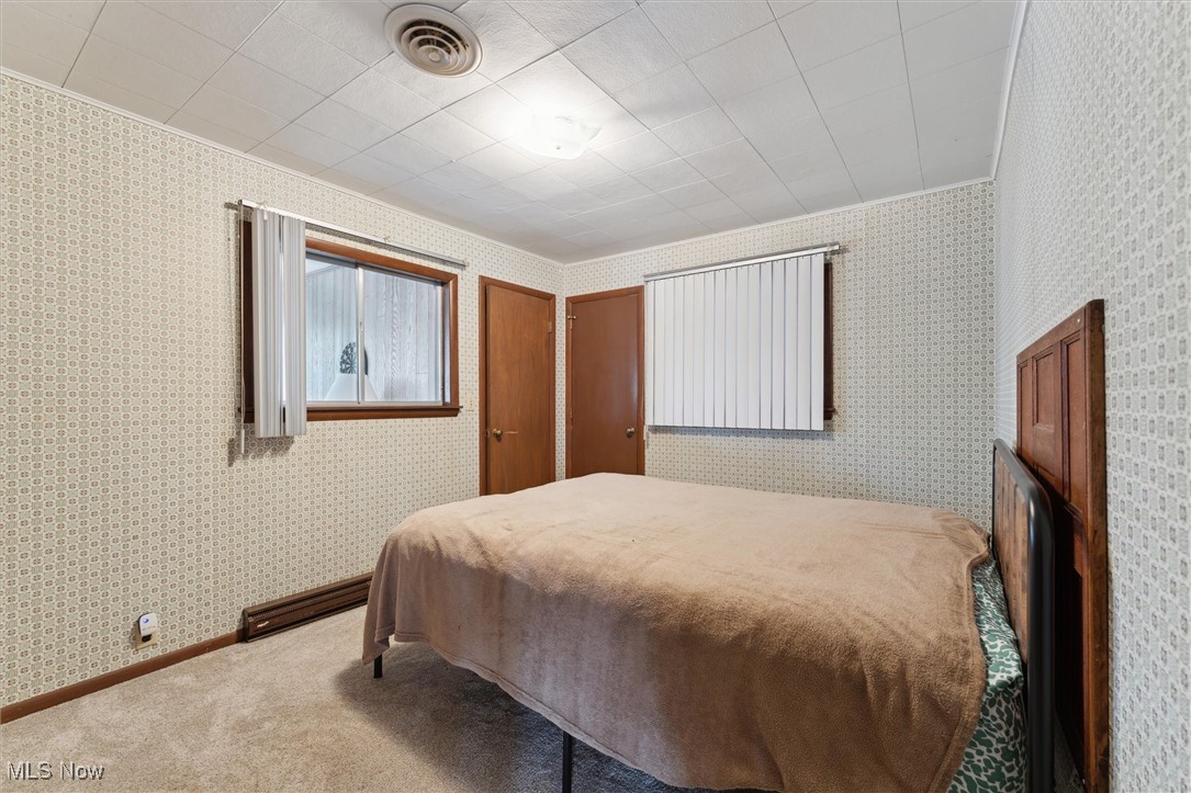 86413 North Bay Road Scio, OH 43988 - Photo 33 of 45 Carpeted bedroom with a baseboard radiator