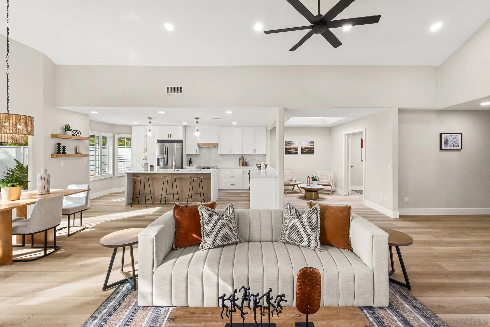 4661 Majorca Way Oceanside, CA 92056 - Photo 16 of 64 a living room with furniture and a table