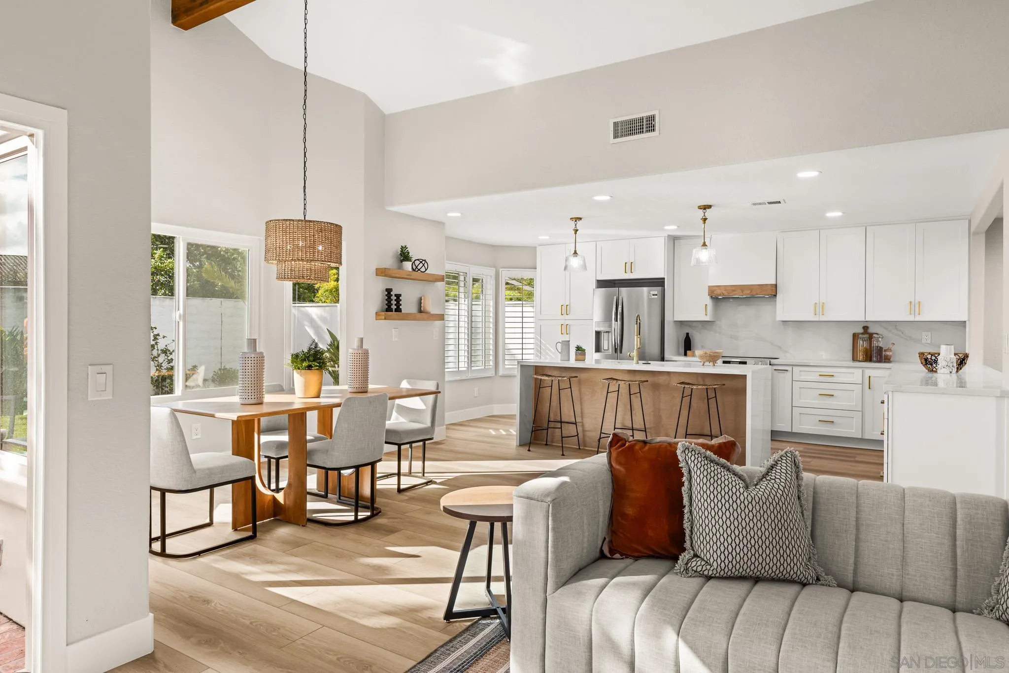 4661 Majorca Way Oceanside, CA 92056 - Photo 18 of 64 a living room with furniture and a large window