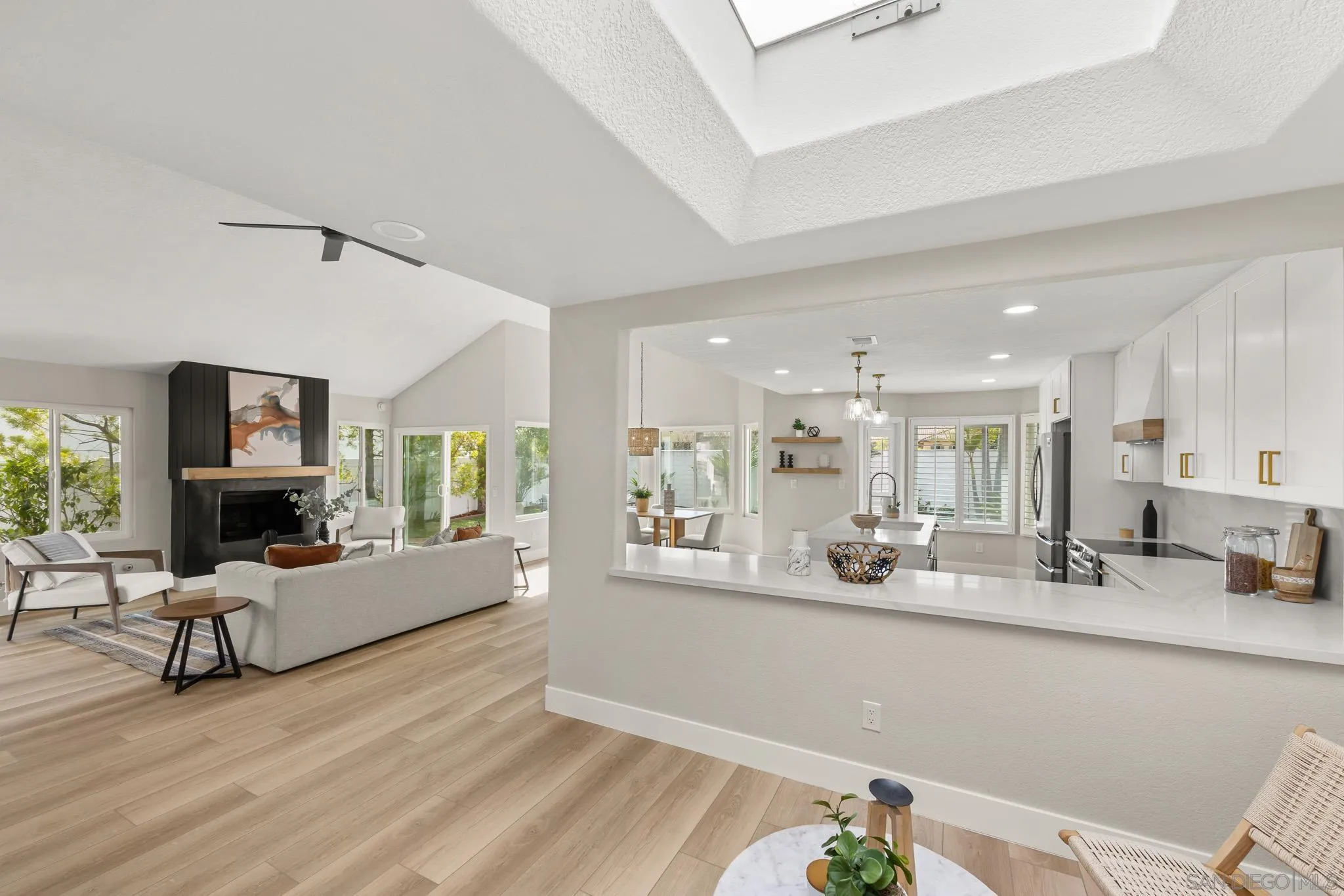 4661 Majorca Way Oceanside, CA 92056 - Photo 19 of 64 a living room with furniture and a wooden floor