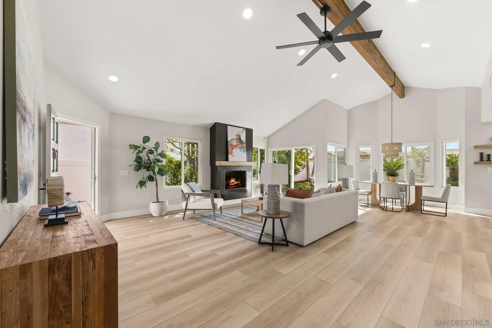 4661 Majorca Way Oceanside, CA 92056 - Photo 22 of 64 a living room with furniture and a wooden floor