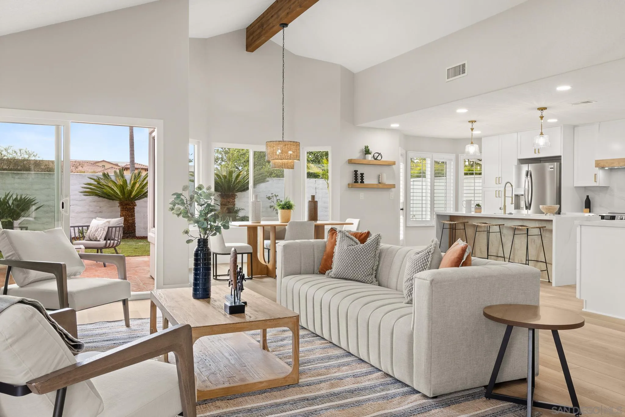 4661 Majorca Way Oceanside, CA 92056 - Photo 10 of 64 a living room with furniture and a table