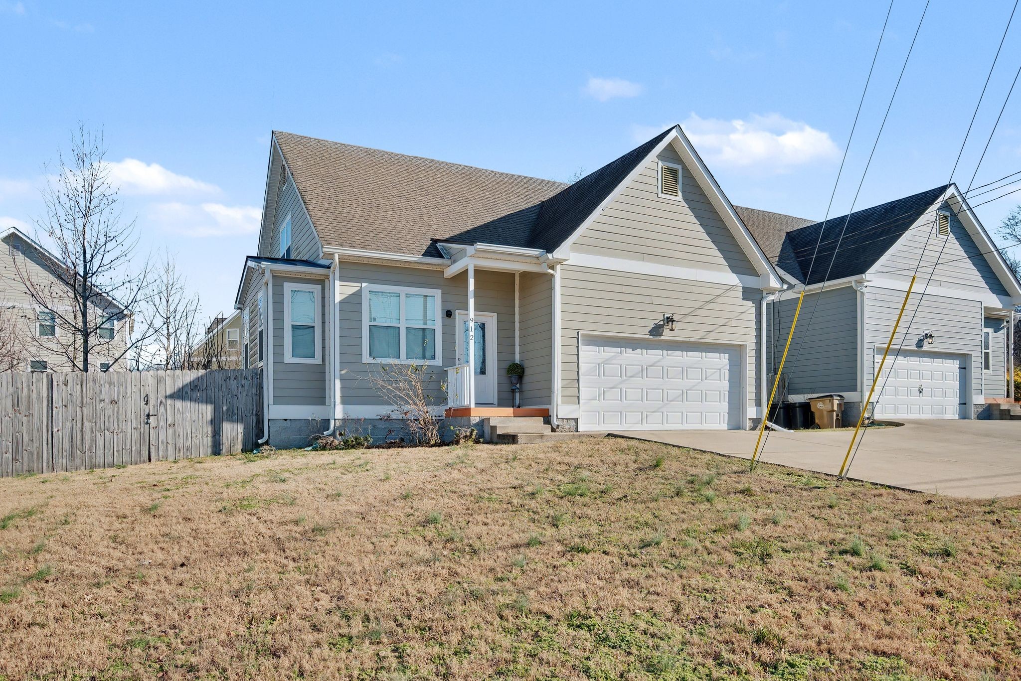 912 Pierce Road Madison, TN 37115 - Photo 3 of 32 a view of a house with snow on the road