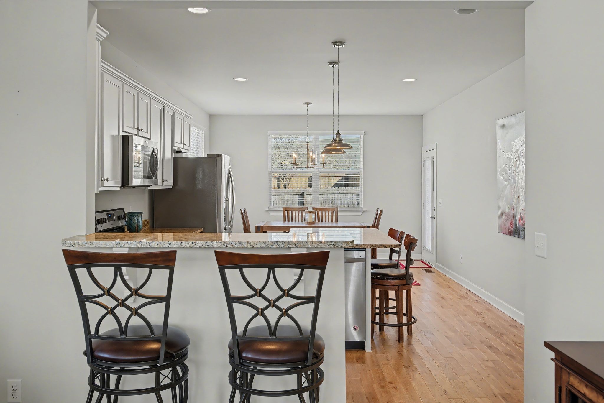 912 Pierce Road Madison, TN 37115 - Photo 7 of 32 a view of a dining room with furniture wooden floor and breakfast area