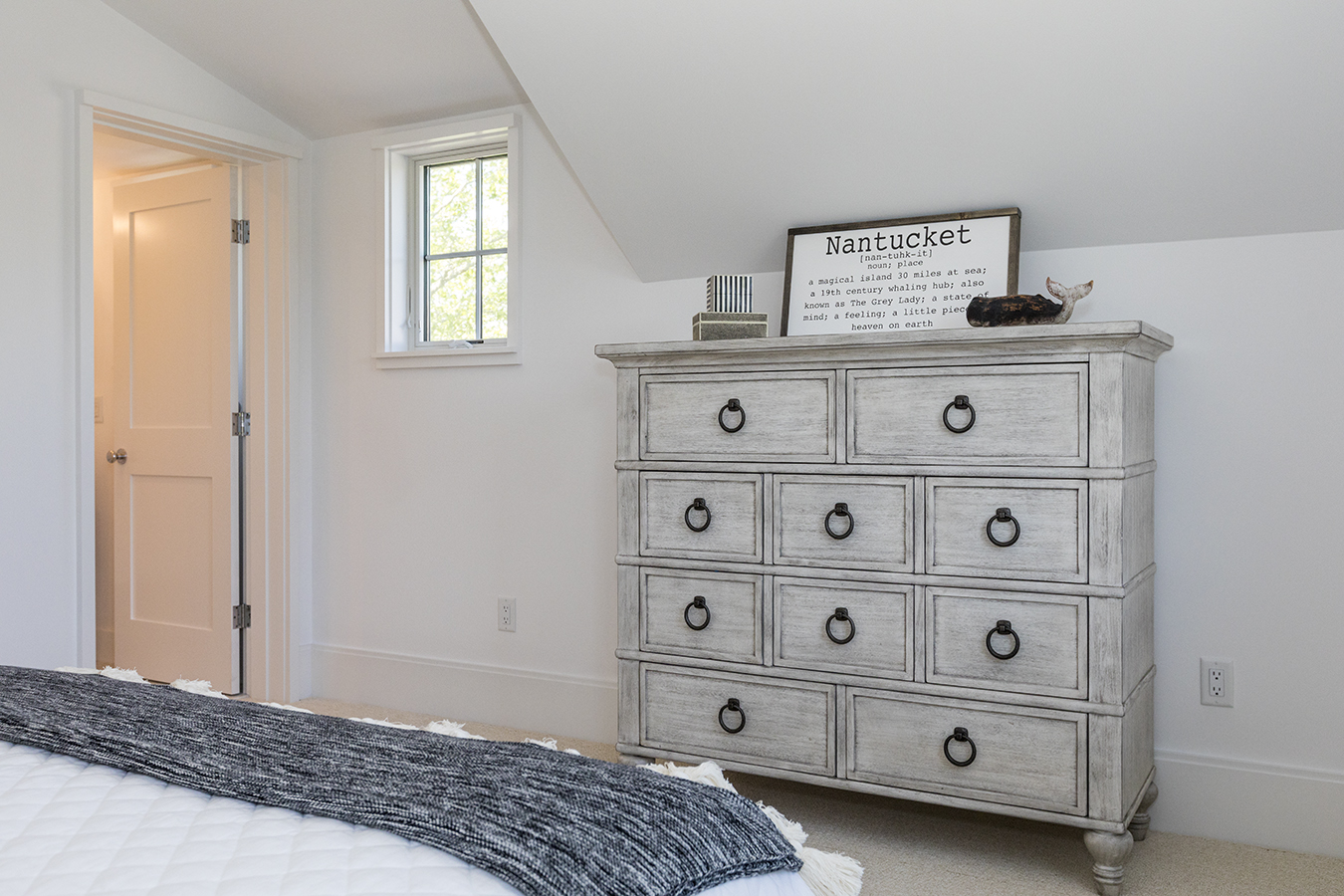 12 Wood Lily Road Nantucket, MA 02554 - Photo 48 of 70 a bedroom with a bed and a window