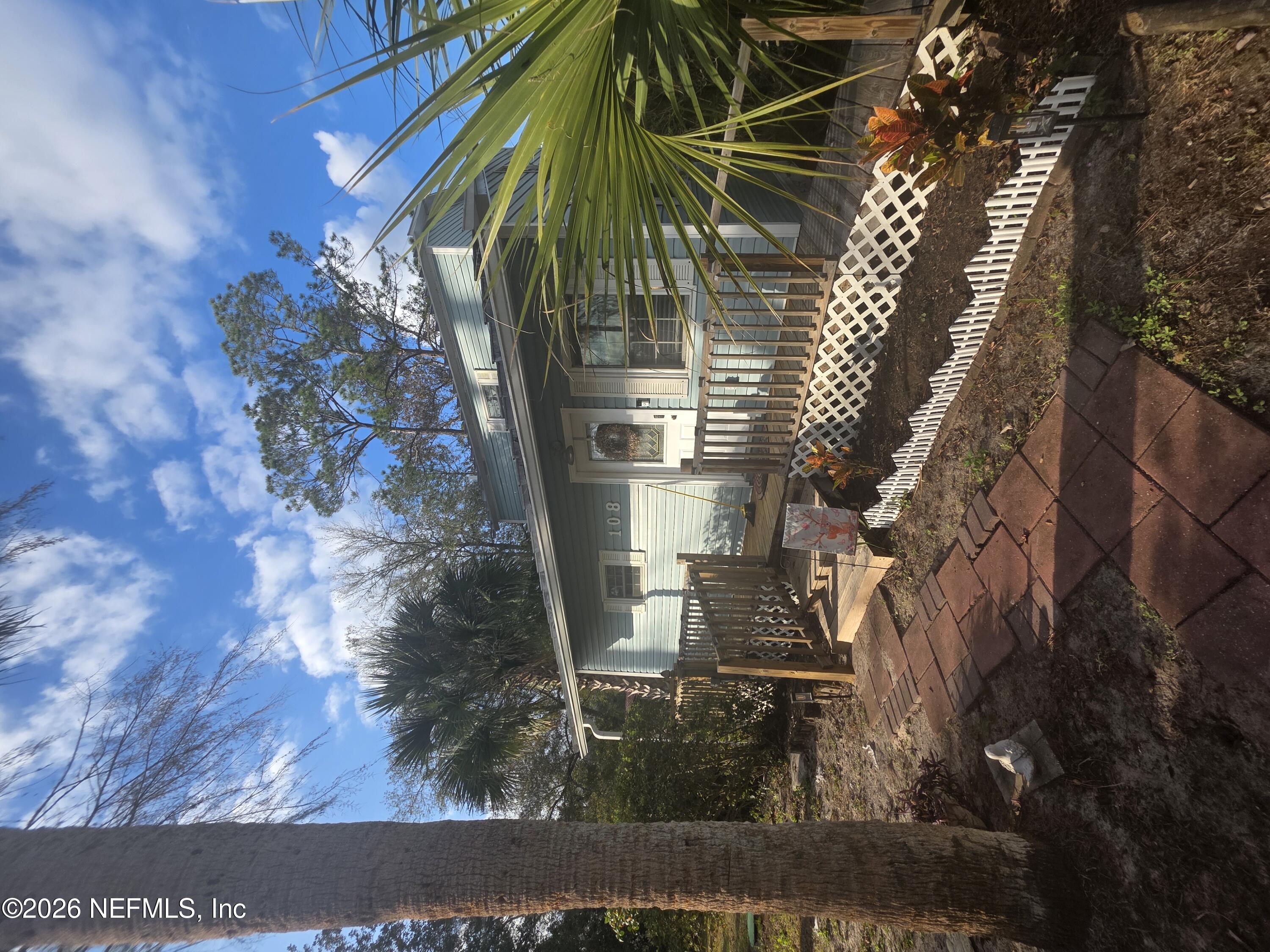 108 Creekside Road Satsuma, FL 32189 - Photo 1 of 51 a front view of a house with a yard