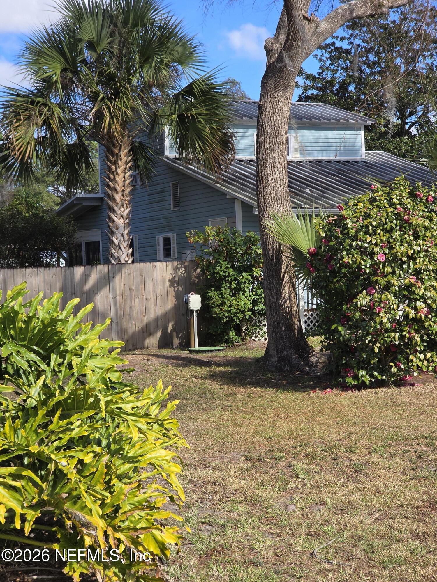 108 Creekside Road Satsuma, FL 32189 - Photo 2 of 51 a view of a garden with plants